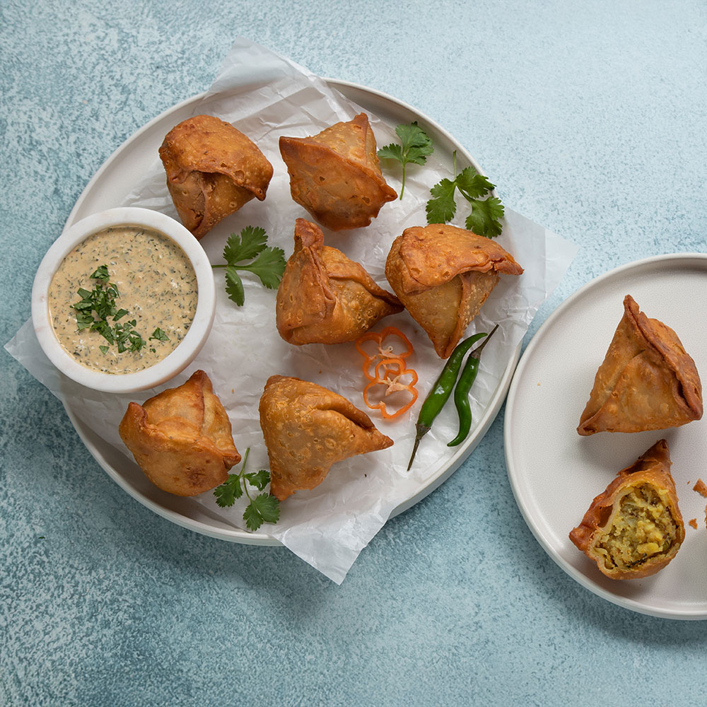 Crispy Potato, Cheese & Pea Samosas with Creamy Fire Chimichurri