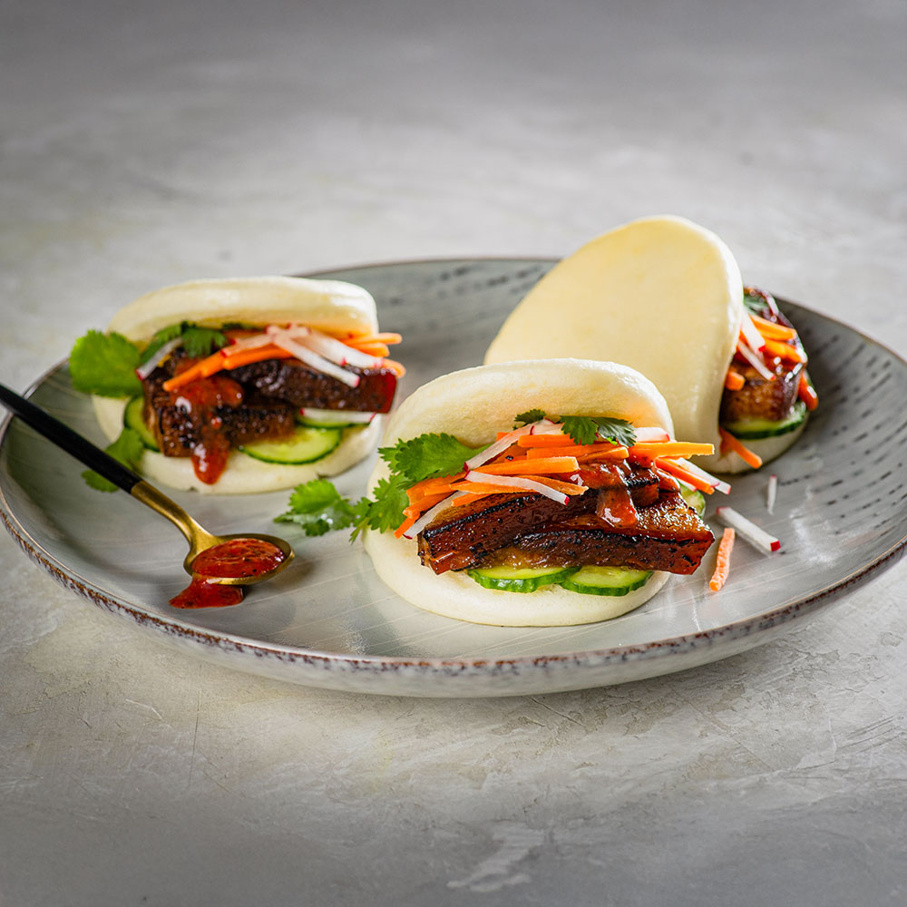 Crispy Pork Belly Bao with Strawberry Habanero, Pickled Veg & Cilantro